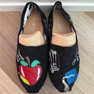 Black Slip-On Shoes with Vibrant Graphics